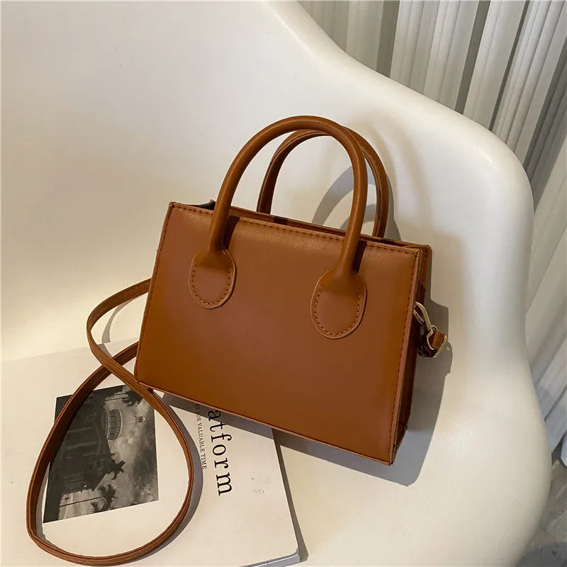 Elegant Black Handbag with Dual Handles