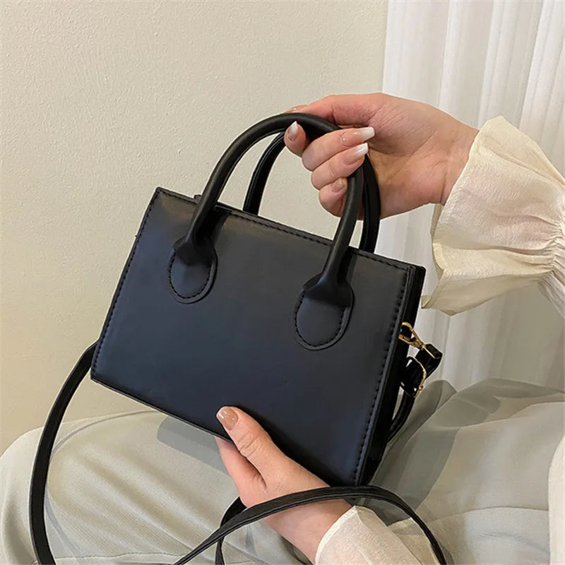 Elegant Black Handbag with Dual Handles