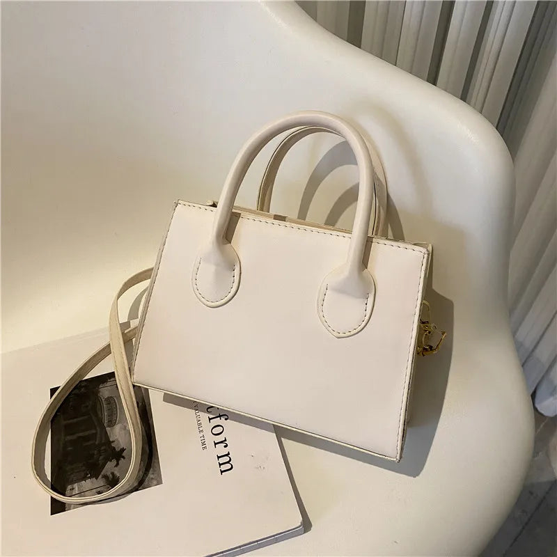 Elegant Black Handbag with Dual Handles